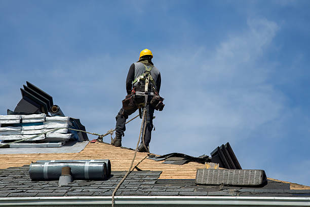 Professional Gutter Installation technician working in Norwell, MA